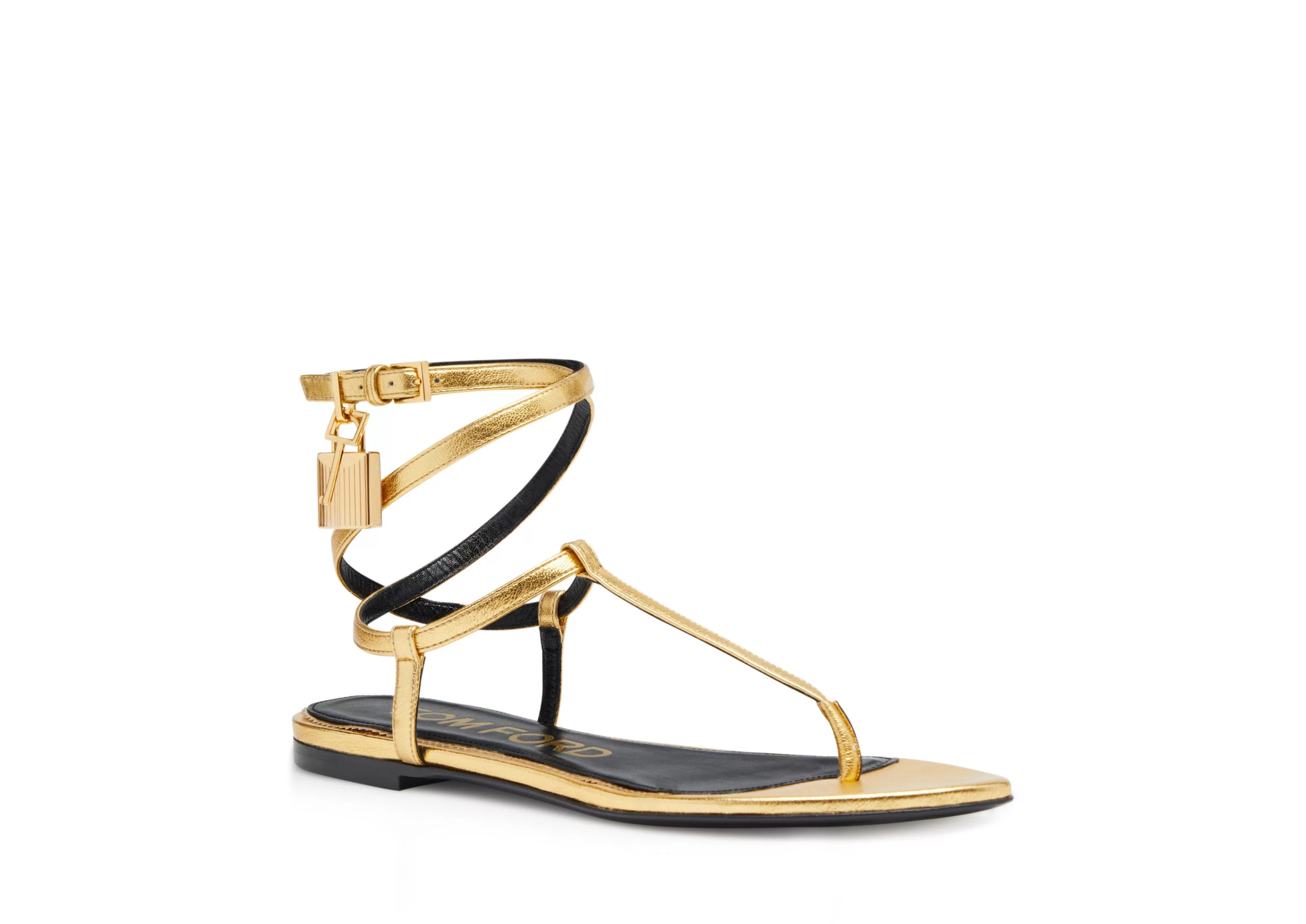 TOM FORD LAMINATED LEATHER PADLOCK SANDAL GOLD^WOMEN | WOMEN | WOMEN | WOMEN Flats | Sandals | The Padlock | JETSETTER EDIT